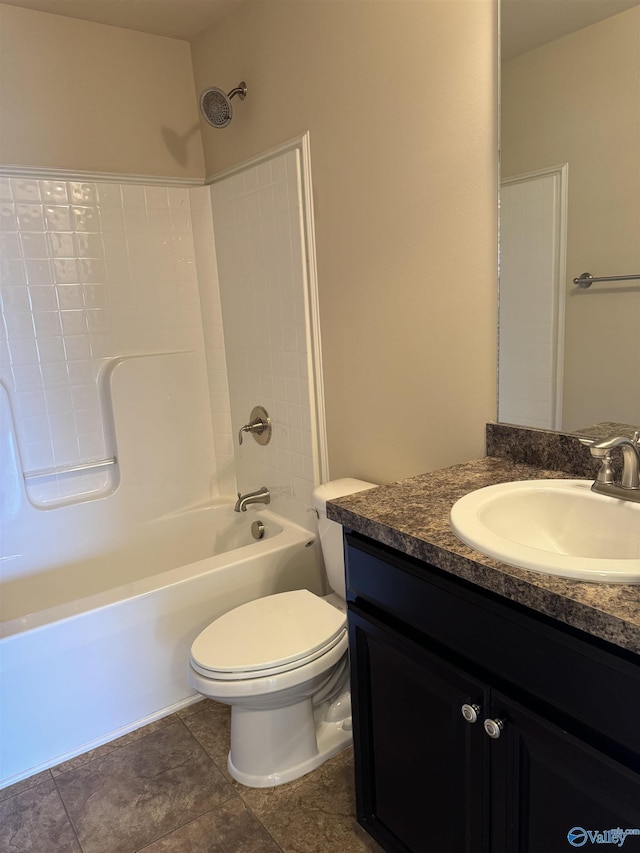 bathroom with toilet,  shower combination, and vanity