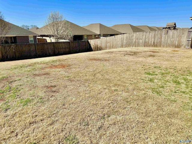 view of yard with fence