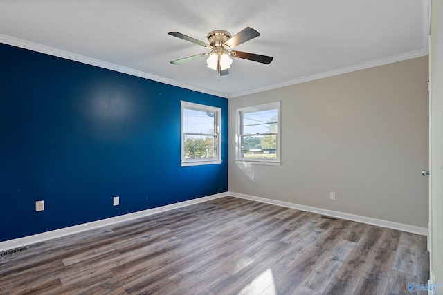 unfurnished room featuring a textured ceiling, wood-type flooring, ornamental molding, and ceiling fan