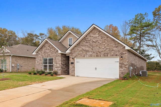 view of front facade featuring a garage, a front lawn, and central air condition unit