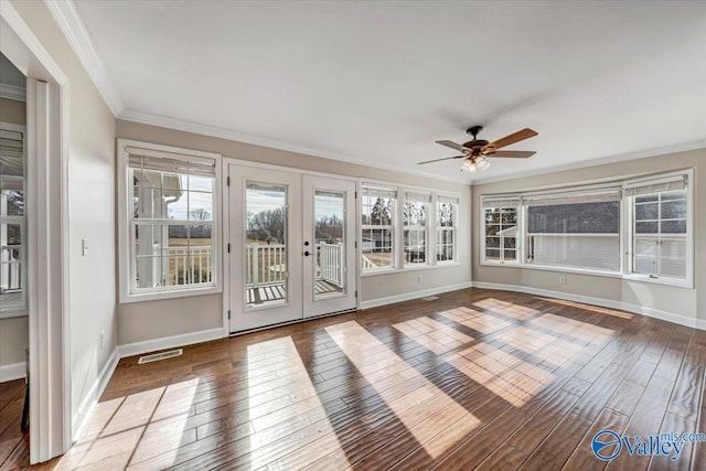 unfurnished sunroom with french doors and ceiling fan