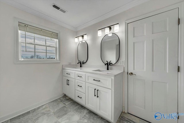 bathroom featuring ornamental molding and vanity