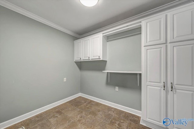 laundry area featuring ornamental molding