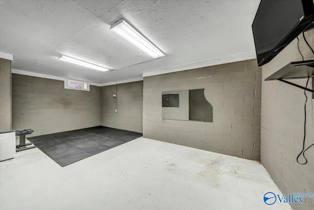 basement with a textured ceiling