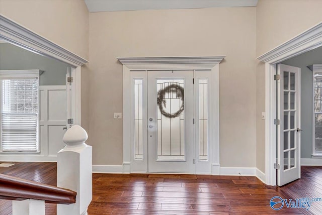 entrance foyer featuring dark wood-type flooring