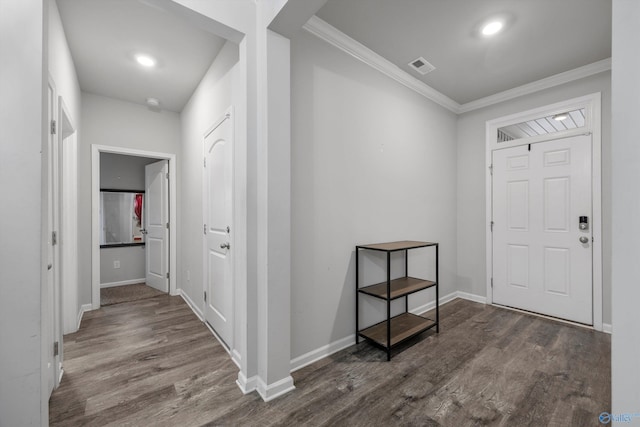 137 Sunlit Grove Dr, Harvest, AL 35749 - foyer entrance with wood finished floors, baseboards, and crown molding