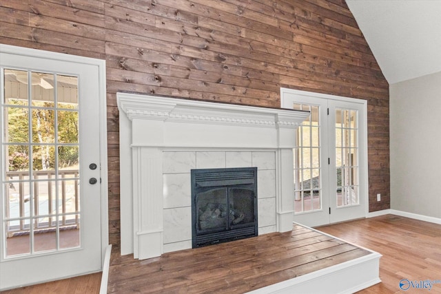 interior details with hardwood / wood-style flooring and a fireplace