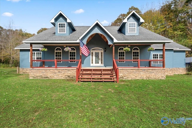 cape cod-style house with french doors and a front yard