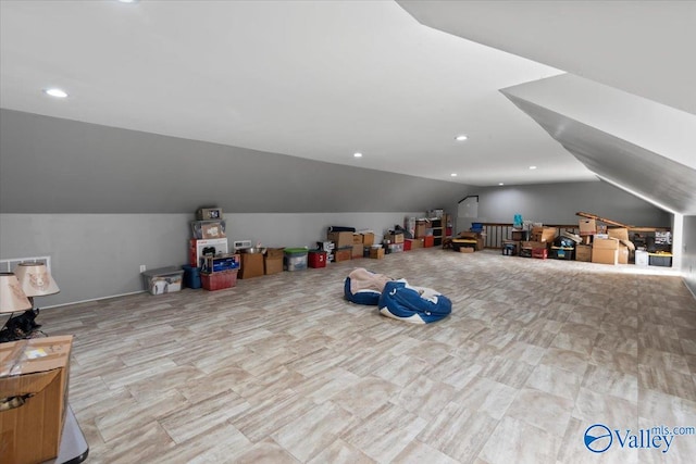 playroom with lofted ceiling