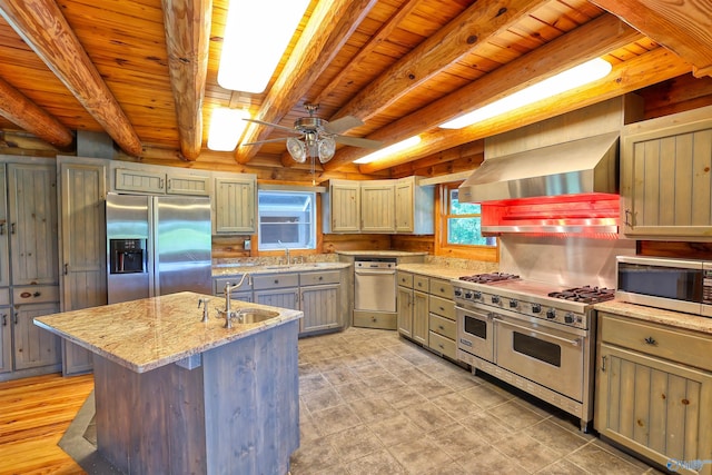 kitchen featuring stainless steel appliances, beam ceiling, light tile patterned flooring, wooden ceiling, and ceiling fan