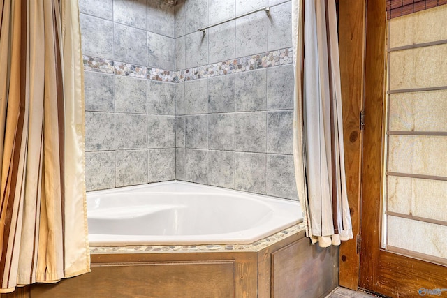 bathroom with a bathing tub