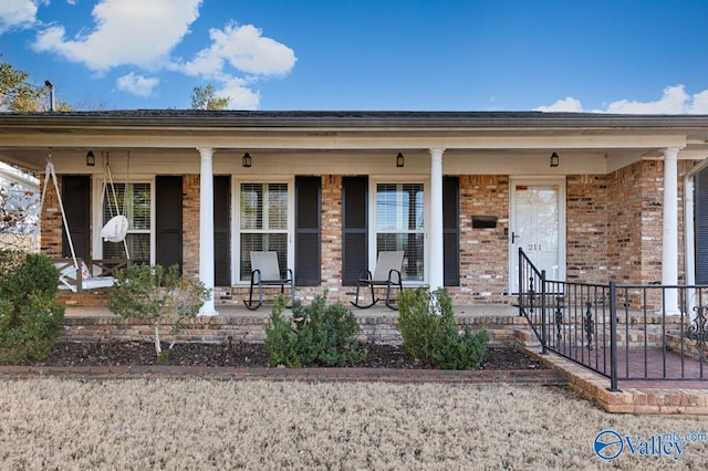 view of front of home featuring covered porch