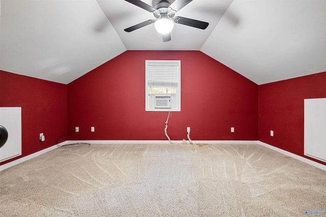 additional living space with cooling unit, ceiling fan, carpet, and lofted ceiling