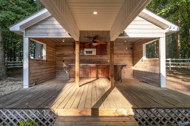 wooden terrace with ceiling fan