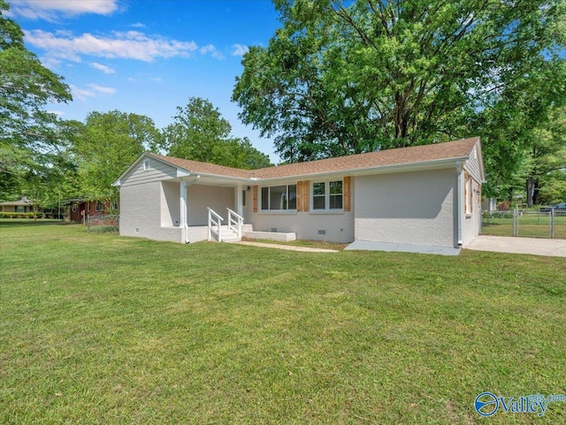 1419 11th St SE, Cullman, AL 35055 - view of front of house with stucco siding, a front lawn, fence, and crawl space