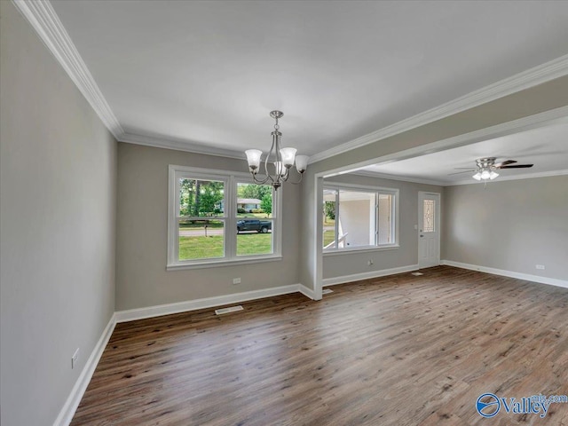 1419 11th St SE, Cullman, AL 35055 - unfurnished dining area featuring visible vents, wood finished floors, baseboards, ceiling fan with notable chandelier, and ornamental molding