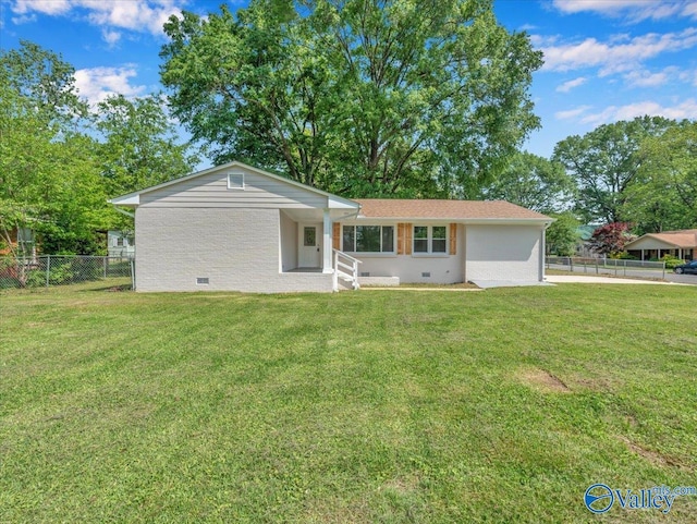 1419 11th St SE, Cullman, AL 35055 - back of house with a lawn, crawl space, and fence