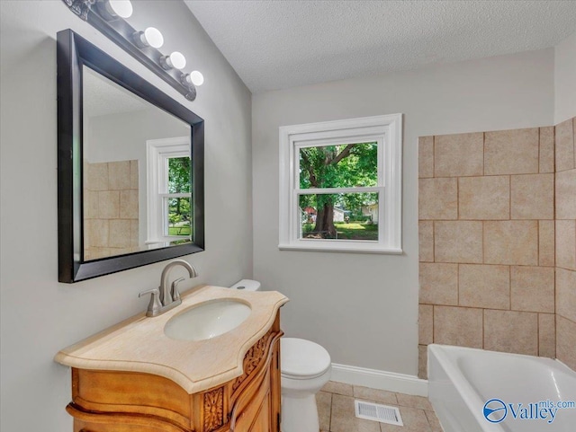 1419 11th St SE, Cullman, AL 35055 - full bathroom featuring plenty of natural light, tile patterned floors, visible vents, and toilet