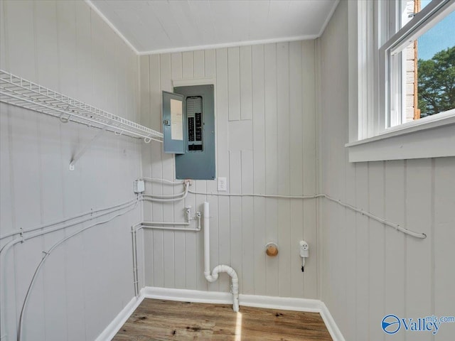 1419 11th St SE, Cullman, AL 35055 - clothes washing area featuring ornamental molding, electric panel, and wood finished floors