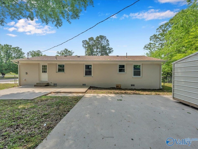 1419 11th St SE, Cullman, AL 35055 - back of property featuring a patio, crawl space, and entry steps