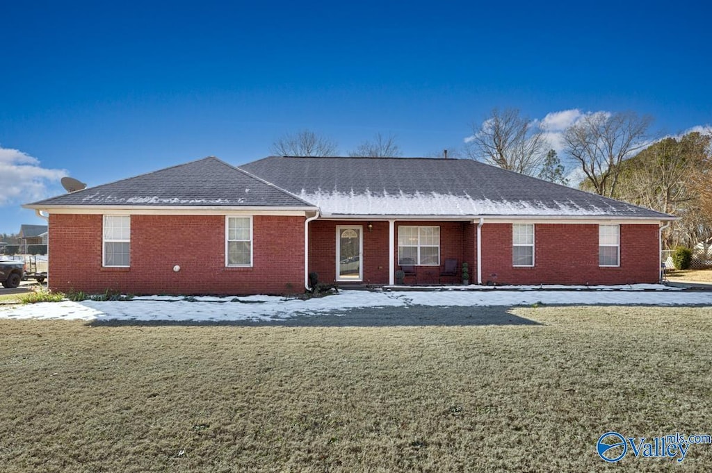 view of front of home with a front yard