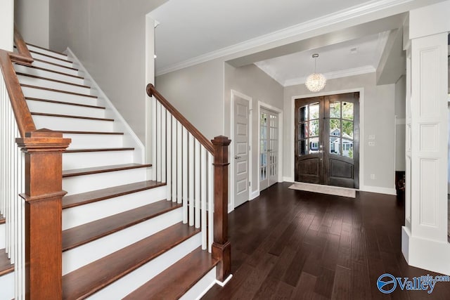 entryway featuring dark wood-type flooring, baseboards, ornamental molding, french doors, and stairway