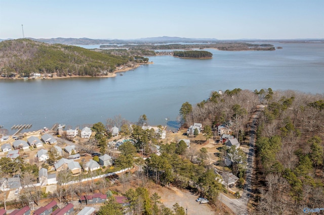 aerial view featuring a water and mountain view