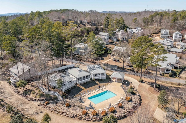 bird's eye view featuring a view of trees