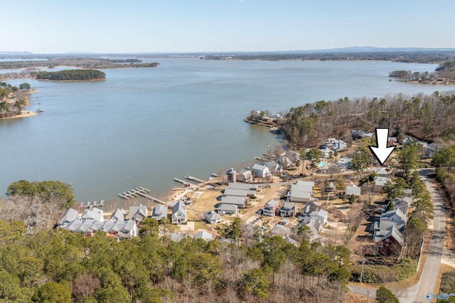 birds eye view of property with a residential view and a water view