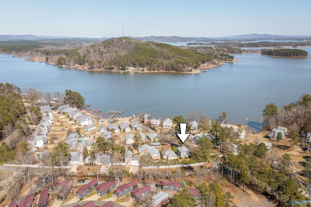 drone / aerial view with a residential view and a water and mountain view