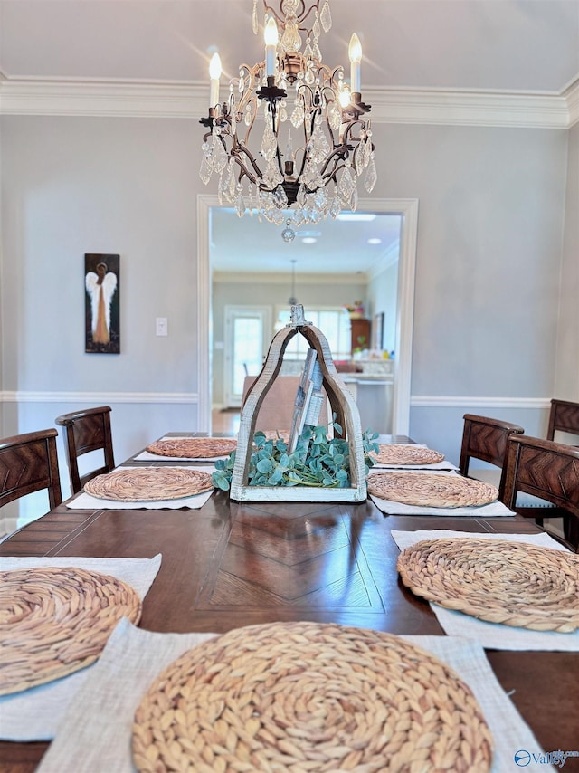 3205 Germantown Pl, Decatur, AL 35603 - dining room with a chandelier and crown molding