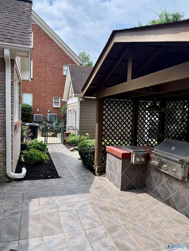 3205 Germantown Pl, Decatur, AL 35603 - view of patio featuring a gate and cooling unit