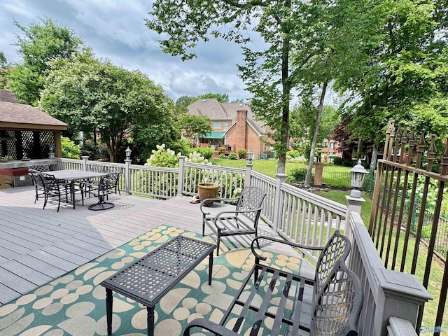 3205 Germantown Pl, Decatur, AL 35603 - wooden terrace featuring outdoor dining area and a lawn