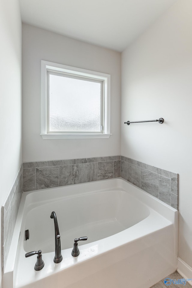 bathroom featuring a bathtub