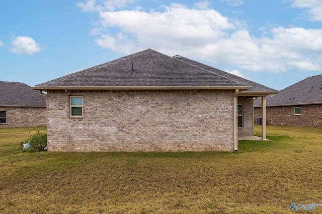 view of home's exterior featuring a lawn