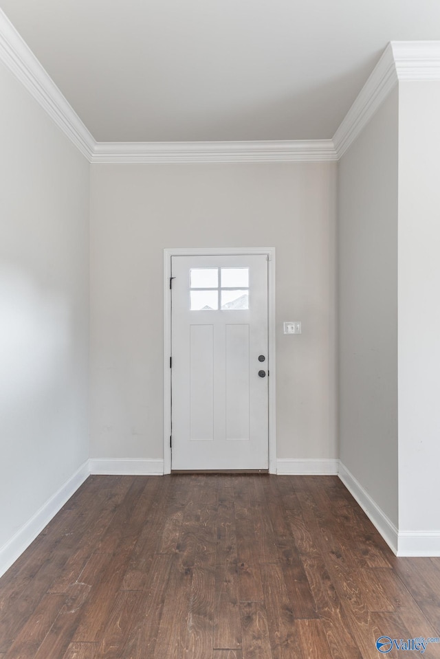 foyer entrance featuring dark wood-type flooring and ornamental molding