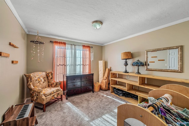 sitting room featuring a textured ceiling, ornamental molding, and carpet flooring