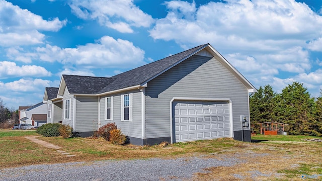 view of home's exterior with a garage