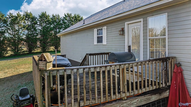 wooden deck with grilling area