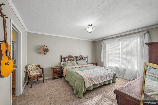 bedroom featuring carpet floors, ornamental molding, and a textured ceiling