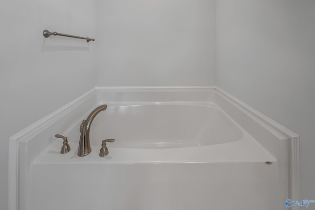 bathroom featuring a garden tub