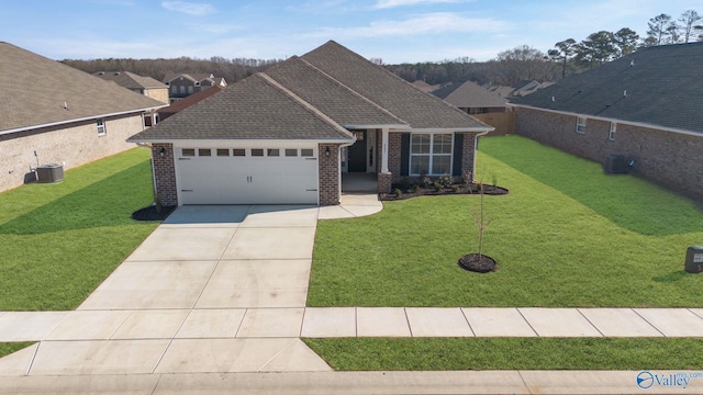 view of front of property with driveway, brick siding, a front lawn, and an attached garage