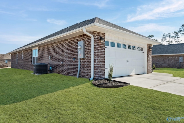 view of side of home with brick siding, a yard, concrete driveway, an attached garage, and cooling unit