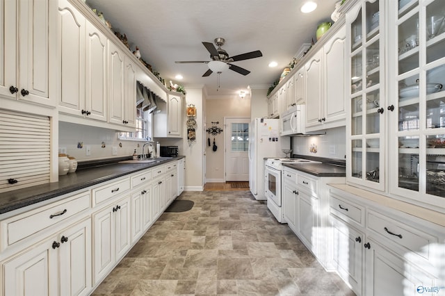 kitchen featuring white cabinetry, white appliances, ornamental molding, and decorative backsplash