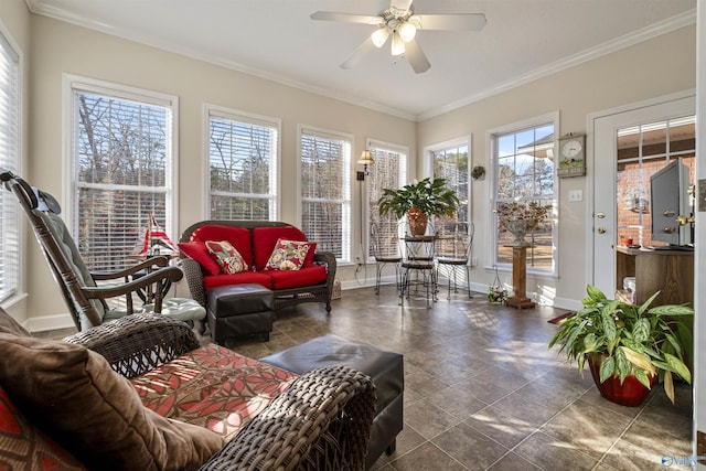 sunroom / solarium with a wealth of natural light and ceiling fan