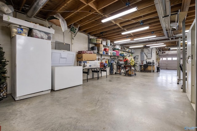 garage with white refrigerator and fridge