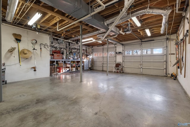 garage featuring a garage door opener