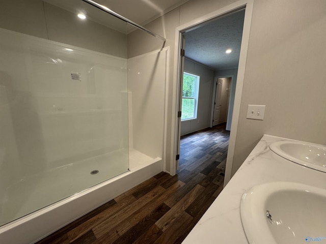 1101 Mcdonald St, Fayetteville, TN 37334 - bathroom featuring a sink, wood finished floors, and a shower