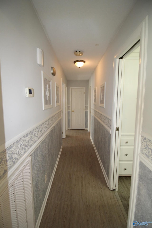 hall featuring dark wood-type flooring