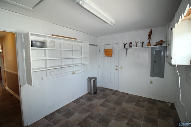 laundry area with electric panel